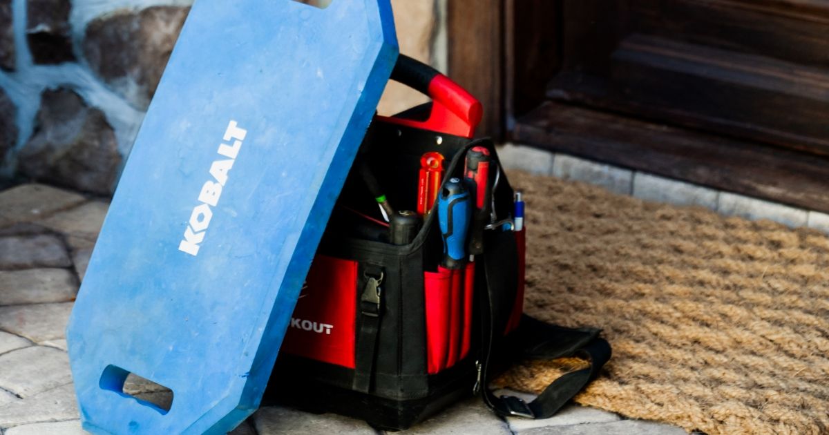 A toolbox with essential repair tools placed near a home's entryway, symbolizing professional furnace repair services in Conway, SC.