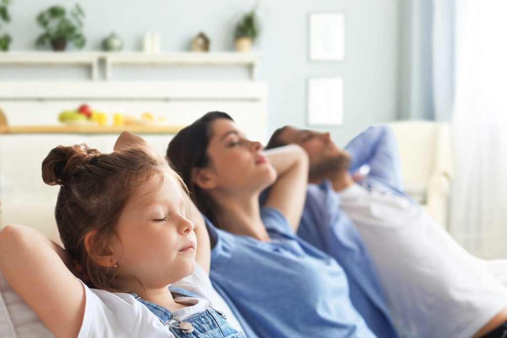 Bigstock Relaxed Young Family Resting A 412500565